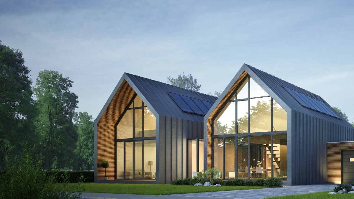 Blick auf zwei Häuser mit Glasfronten.